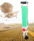 Manual Planter Transplanter Handheld Seeder For Garden Seedling Planting Tool With Fertilizer Spreader in field with seeds.