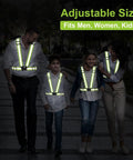 Family wearing Reflective Running Vest 2 Pack High Visibility Gear for night safety.