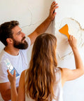 Fast Dry Wall Crack Repair Paste For Quick Fixes And Smooth Restoration application on cracked wall with spatula tool