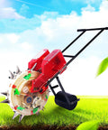 Hand Push Garden Seeder with Dual Seed and Fertilizer Buckets, Manual Roller Seeding Tool on grass, blue sky backdrop