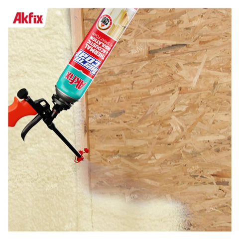 No Fuss Fire Rated Spray Foam Insulation Kit Covers 240 Square Feet includes trigger gun applying foam to wall.