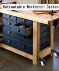 Heavy Duty Retractable Casters With Foot Tap Release, Smooth Polyurethane Wheels For Moving Workbenches And Gear, Solid Steel Base Handles Massive Loads Without Breaking A Sweat, Complete Four Piece Set, shown on workbench.