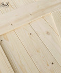 Close-up of unfinished wood on a 32 Inch By 84 Inch Double Unfinished British Brace Barn Door With 13 Foot Sliding Hardware Kit Solid Wood Built To Last Double Sided Panels Ready For Stain Or Paint And Easy Assembly For A Rustic Room Divider