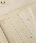Certified Top Shelf Solid Spruce British Brace Knotty Barn Door 30X84 Inch unfinished wood close-up showing natural grain.