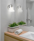 Modern bathroom with mirrored 4 Light LED Vanity Light Fixture In Brass Gold And Oil Rubbed Bronze With Clear Glass Shade, LED bulbs included.