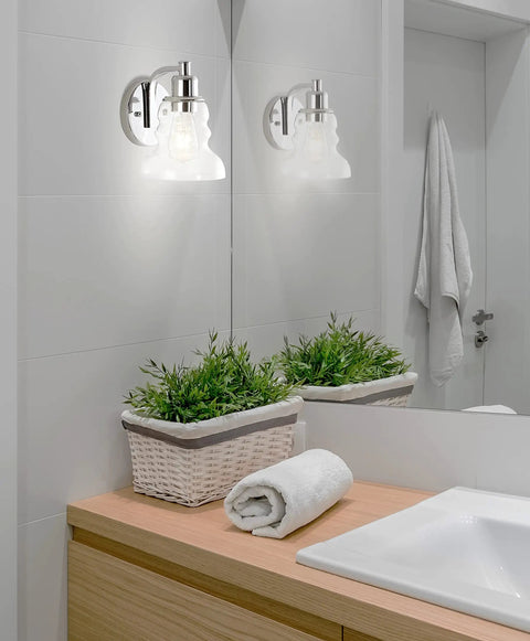 Modern bathroom with mirrored 4 Light LED Vanity Light Fixture In Brass Gold And Oil Rubbed Bronze With Clear Glass Shade, LED bulbs included.