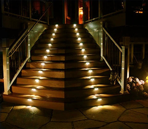 Outdoor Solar Deck Lights Pack Of 6, Waterproof Stainless Steel Stair And Path LED Lights illuminating garden stairs at night