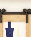 Sliding Barn Door Hardware Kit With Y Shape Rollers And Upgraded Nylon Bearings For Quiet, Smooth Operation, Heavy Duty Track System Delivers Stable And Sturdy Performance For A 5 Foot Door installed on a wood door