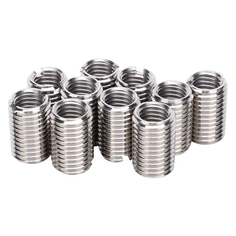 Front view of stainless steel threaded sleeve inserts for thread repair, group of small cylindrical adapters
