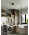 Coastal Farmhouse 1 Light Pendant in Graphite Finish with Open Cage Frame hanging in modern rustic kitchen, view from side.