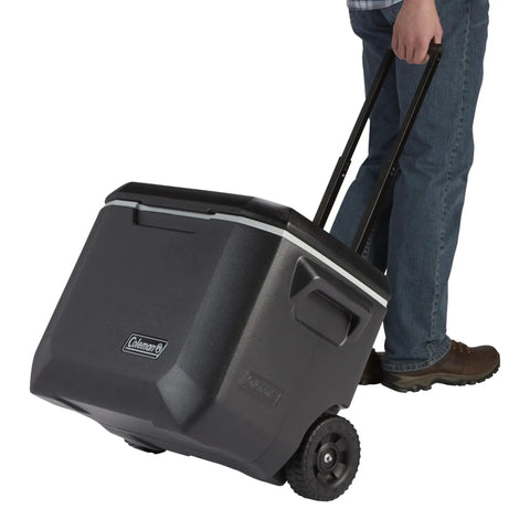 Man pulling Xtreme 50 Quart Rolling Cooler With Wheels For Easy Transport And Extended Ice Retention Up To Five Days At 90 Degrees Fahrenheit