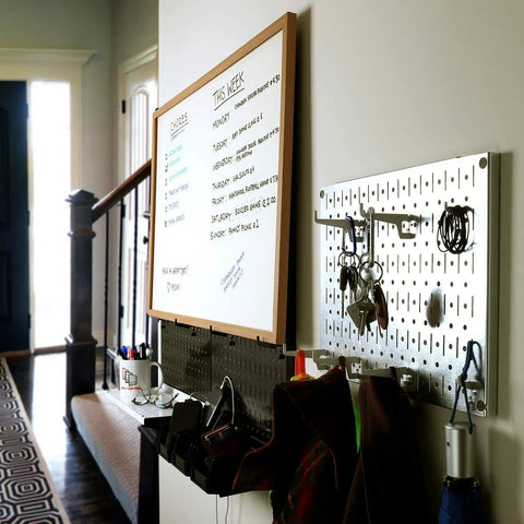 Modular Pegboard Wall Organizer Tiles Set DIY Friendly Four 12 Inch Tall By 16 Inch Wide Steel Peg Board Panels in hallway