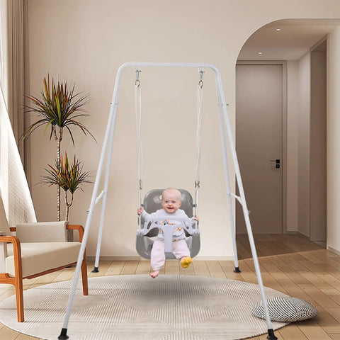 3 In 1 Toddler Swing Set For Backyard And Indoor Use, Kid Friendly Swing That Grows With Your Little One From 6 Months To 10 Years, Outdoor Indoor Swing With Detachable Modes, Sturdy Black Frame, baby sitting indoors.