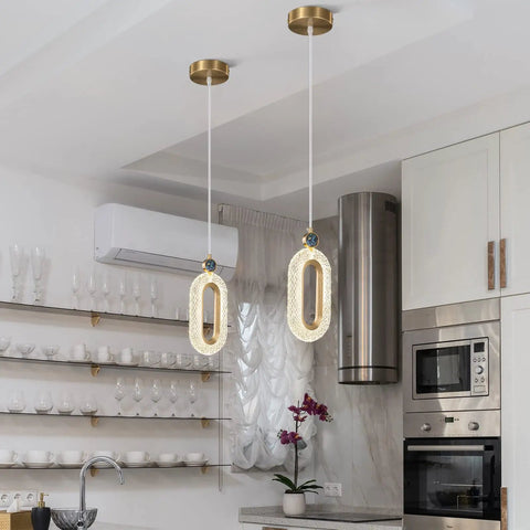 Pendant Lighting for Kitchen Island LED Dimmable Modern Gold Brushed Brass Mini Pendant Lights with Circular Diamond Textured Acrylic Accents 2 Pack hanging in kitchen