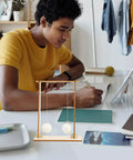 Student using Two-Piece Physics Experiment Kit For Students, Engaging Science Tools For Classroom And Home Learning on desk.