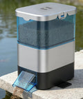 Top Shelf Automatic Pond Fish Feeder With Large Capacity And Adjustable Timer, moisture-proof koi food dispenser, outdoors.
