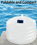 Collapsible Water Storage Container With Spigot 3L 5L 10L Foldable Clear Water Jug on a table with ocean background