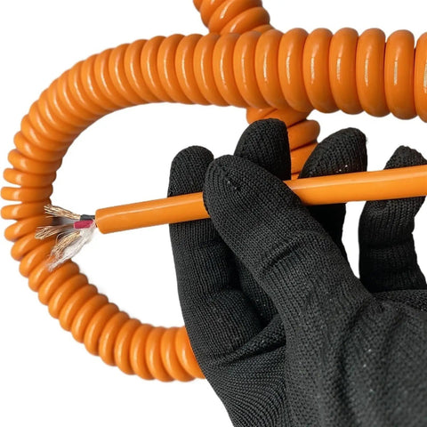 Heavy Duty Coiled Extension Cord Designed Badass Tough With Rock Solid 17 Awg Copper and Oil Resistant Polyurethane that Reaches Six Meters.