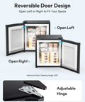 Compact One Point One Cubic Foot Upright Mini Freezer With Reversible Door And Adjustable Feet showing reversible door design and hinge.