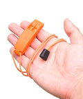 Hand holding orange whistle with lanyard from 2X Survival Whistles With Lanyards And 2X Reflective Signal Mirrors, Grab-And-Go Rescue Kit.