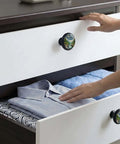 Forest Mountain Round Acrylic Cabinet Knobs 4 Pack Rustic Nature Drawer Pulls on white dresser with folded clothes.