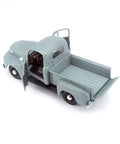 Top view of Vintage Ford 1948 F1 Pickup Diecast Model 1 25 Scale Gray Special Edition with open doors and trunk