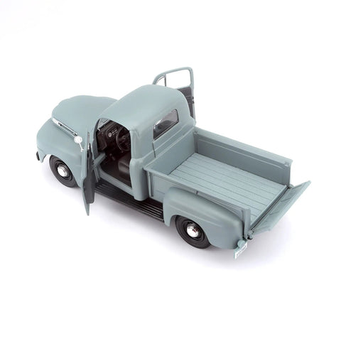 Top view of Vintage Ford 1948 F1 Pickup Diecast Model 1 25 Scale Gray Special Edition with open doors and trunk