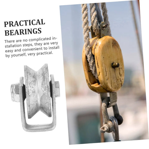 Heavy-duty cast-iron V-groove wheel pulley with rigid bracket; installed on a lifting rope.