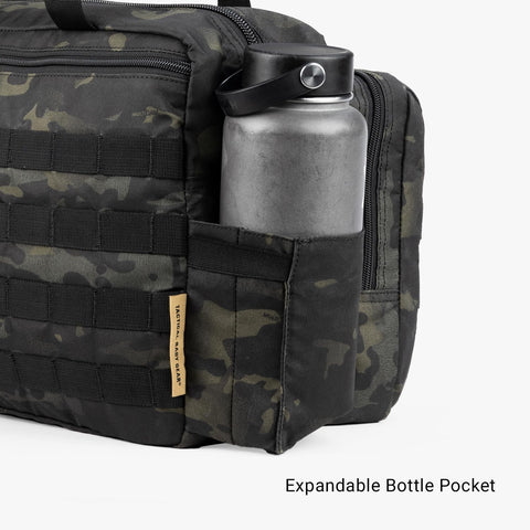 Expandable bottle pocket on Deuce 4th Gen Tactical Diaper Bag For Dads With Included Changing Mat And Stroller Straps Water Resistant 600D