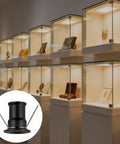 wkao 9 Pcs Led Mini Downlight, 1W DC12V Embedded Spotlight for Cabinets and Showcases in display cases with a warm glow.