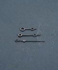 Metal Watch Hands Set Compatible With NH35 364R 7S Movements Replacement Parts Upgrade Kit In Black on a textured surface.