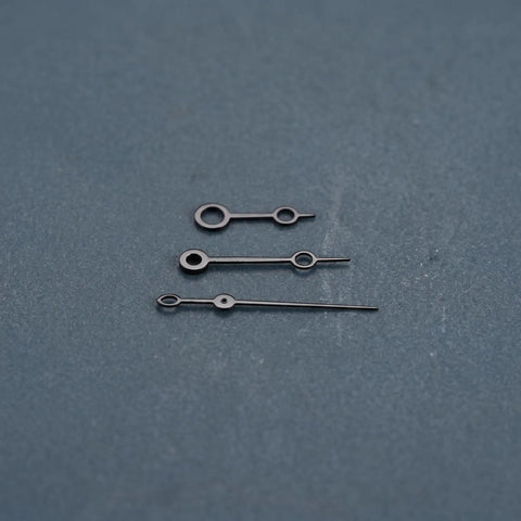 Metal Watch Hands Set Compatible With NH35 364R 7S Movements Replacement Parts Upgrade Kit In Black on a textured surface.