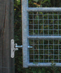Two Pack 304 Stainless Steel Chain Link Gate Hinges With Five Eighth Inch Hinge Pin installed on fence gate