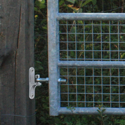 Two Pack 304 Stainless Steel Chain Link Gate Hinges With Five Eighth Inch Hinge Pin installed on fence gate