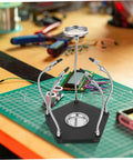 LED Magnifying Lamp With Magnifying Glass Holder for soldering circuit boards, sturdy third hand tool on a workbench