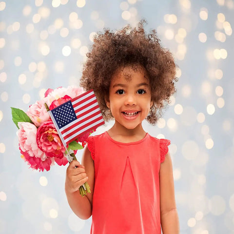 Child holding bouquet with Six Pack 4x6 Inch Small American Flags On Wooden Sticks Handheld USA Flags With Kid Safe Spear Top