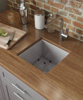 13 By 15 Inch Undermount Bar Prep Kitchen Sink Single Bowl 16 Gauge Stainless Steel Zero Radius Brushed Finish T 304 Grade Rust Resistant Space Saver For Small Bar And Prep Area installed in wooden countertop.