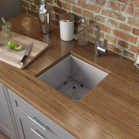 13 By 15 Inch Undermount Bar Prep Kitchen Sink Single Bowl 16 Gauge Stainless Steel Zero Radius Brushed Finish T 304 Grade Rust Resistant Space Saver For Small Bar And Prep Area installed in wooden countertop.