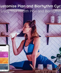 Woman in workout attire drinking milk with smartphone displaying health plan app interface.