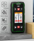 Kickass 5-In-1 Wall Scanner Featuring Advanced Sensor Tech And Bright Lcd Readouts for detecting wood, metal, and wires on a countertop.