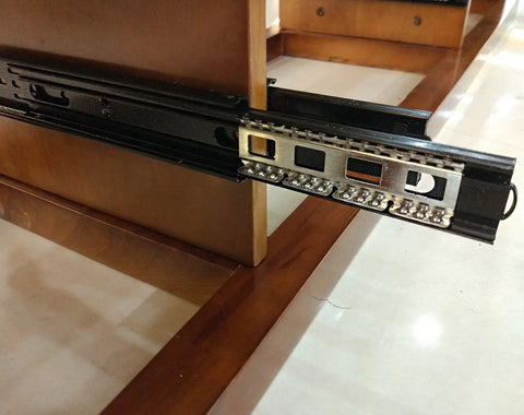 12 Inch Full Extension Drawer Slides With Ball Bearing Rails, 3 Section Black Drawer Glide Pair shown in wooden cabinet