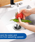 Hand washing vegetables in sink with Splash Guard Collar For Garbage Disposals 3 1 8 Inch Multi Function Drain Plugs Sink Baffle on drain