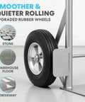 Close-up of upgraded rubber wheel on moving equipment demonstrating smoother rolling on stone, warehouse floor, and driveway surfaces.