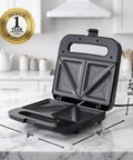 Ovente Electric Sandwich Maker With Quick Heating Non Stick Plates For Toasting Paninis And Omelets Perfect Hot Pressed Breakfast Grill Machine In Sleek Black Finish, open with measurements.