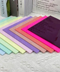 Front view of 10-color 3mm cell-cast acrylic sheets, 8x8 in (200x200 mm), rainbow stack for laser cutting.