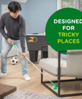 Person using 2-In-1 Floor Mop And Sweeper Starter Kit to clean under chair, no dustpan or bucket needed, multi surface cleaner for tricky places.