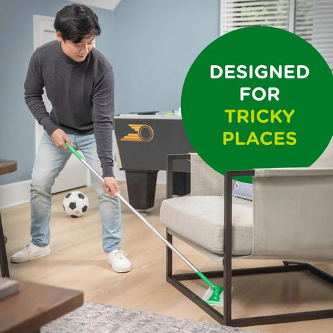 Person using 2-In-1 Floor Mop And Sweeper Starter Kit to clean under chair, no dustpan or bucket needed, multi surface cleaner for tricky places.