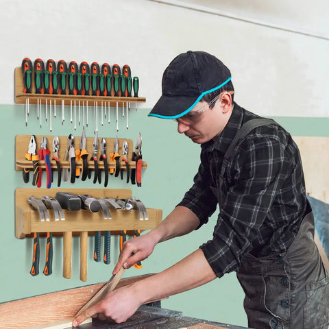 Man using workbench with Must Have Wall Mount Screwdriver Rack And Pliers Holder Set Bamboo Tool Organizer in garage