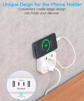 Compact Wall Outlet Extender With 3 AC Outlets And 4 USB Ports Featuring Built In Surge Protector, phone charging on wall.