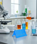 Cool Homoyoyo Lab Slide Drying Rack Pack beside glass beakers and a microscope in a lab setting.